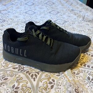 Black NoBull with army green soles.